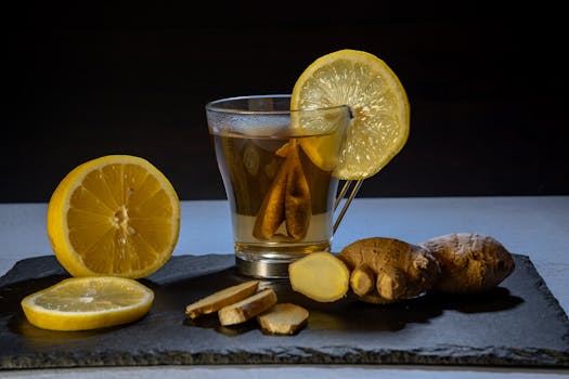 A refreshing ginger lemon tea with fresh lemon and ginger slices, perfect for immune support.